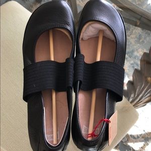 Black leather ballet slippers